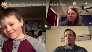Screenshot of two adults and a child on a video call